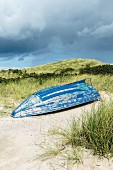 An overturned boat in the dunes on Sylt