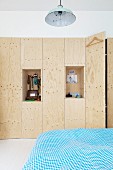 Custom, fitted plywood wardrobe with two open shelf niches for jewellery and other items