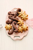 Various spiced Christmas biscuits on a serving platter