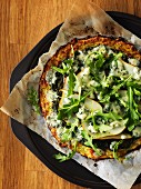 Rocket and pear pizza with gorgonzola