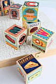 Wooden toy blocks with illustrations of food and letters