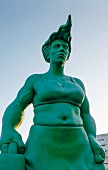 A green giant statue at Westerland station, Sylt