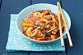 Sweet and sour pork with vegetables and mushrooms (China)