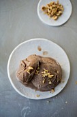 Chocolate ice cream with chopped nuts