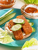 A fish finger sandwich with cream cheese and cucumber