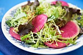Frisee lettuce with pink radish