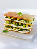 Mille feuilles with cream cheese, avocado and green asparagus