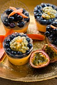 Mini cheesecakes with blueberries and passion fruit