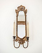 Antique candle sconce with integrated mirror