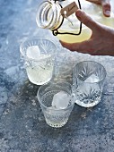 Lemonade being poured into glasses