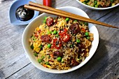 Egg fried rice with bacon and vegetables (Asia)