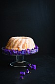 Lemon Bundt cake decorated with violets