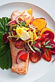 Poached salmon with summer fruits and onions