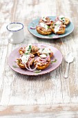 Baked potatoes with tuna fish, red onions and Greek yoghurt
