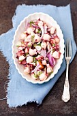 Marinated octopus with thyme and red onions