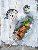 Salmon fondue with a coconut milk and onion dip (Thailand)