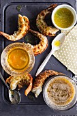 Grilled prawns with various butter sauces for Christmas