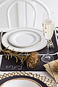 Festive place setting with champagne glass
