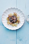Chocolate cream with pears and icing sugar