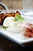 Burrata (cow's milk cheese, Italy) with ham and grilled bread