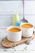Two cups of butternut squash soup