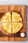 Pizza bianca with potatoes, quartered