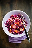 Red cabbage salad with fruits