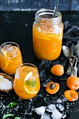 Refreshing apricot punch with lemons, mint and a pinch of salt
