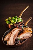 Roast pork belly with Brussels sprouts