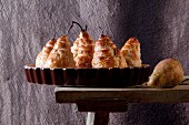 Pears wrapped in puff pastry filled with cheese and walnuts