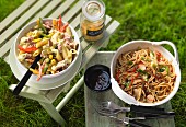 Curry noodle salad and an oriental noodle salad for a barbecue party