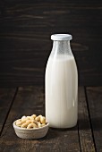 Cashew nut milk in a glass bottle