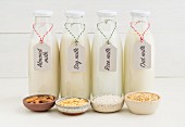 Bottle of almond milk, soya milk, rice milk and oat milk