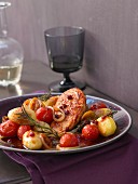 Tuscan chicken bake with potatoes and cherry tomatoes