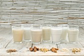 Various types of lactose-free milks in glasses
