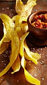 Plantain chips with salsa de yolanda (chilli sauce)