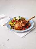 Pork chop with tomatoes, potatoes and garlic