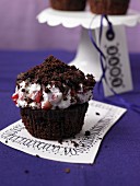 A molehill muffin with strawberry cream
