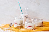 Rice desserts in glass jars, rice milk and rice grains