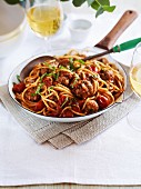 Spaghetti with meatballs and tomatoes