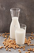 Soya milk in a carafe and in a glass