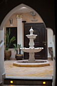 Courtyard with Arabian-style, stone fountain