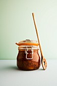 Dried fig chutney with honey in a flip-top jar