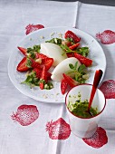 Buttermilk mousse with strawberries and nut pesto