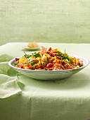 Tagliatelle mit Schinken, Kirschtomaten & Rucola