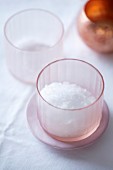 Maldon salt in a pink glass