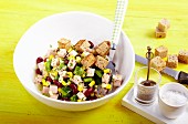 Bean and sausage salad with croutons