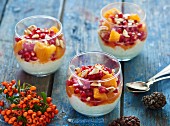 Orange salad with rice pudding and pomegranate seeds