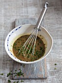 Vegan miso dressing with orange juice, ginger and chives