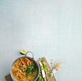 Chickpea and carrot curry with spring onions